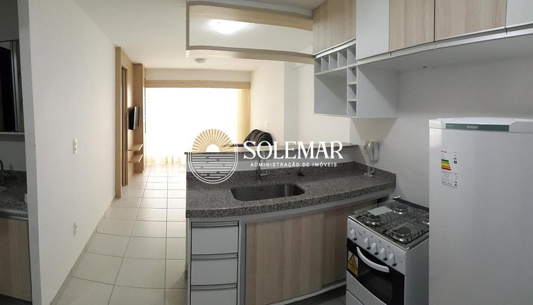 Apartamento con una suite y un dormitorio con litera.