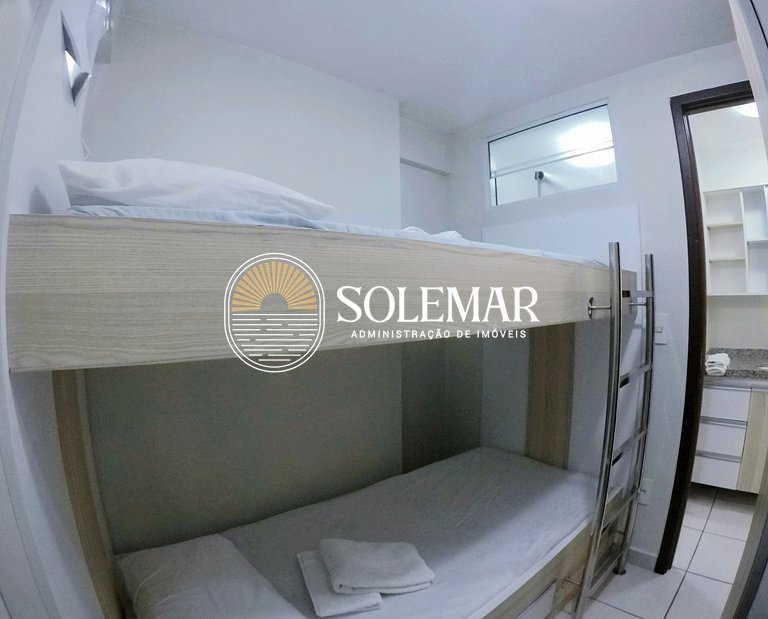 Apto com uma suíte e um quarto com cama beliche