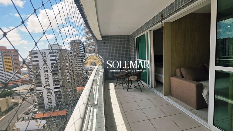 Apartamento con suite y un dormitorio con literas y sofá cam