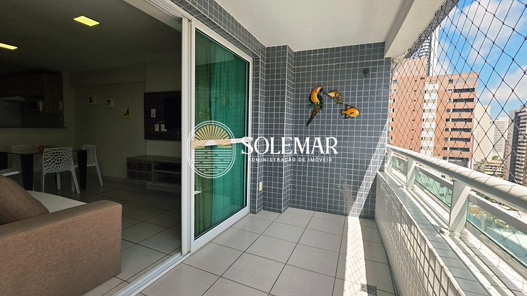 Apartamento con suite y un dormitorio con literas y sofá cam